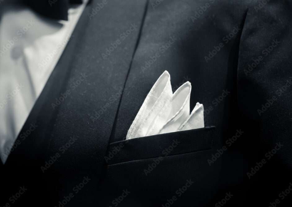 gentle-man-closeup-groom-tuxedo-suit-for-luxury-dinner-black-and-white-art-tone-stockpack-adobe-stock