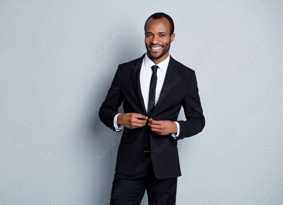 How to Choose the Perfect Black Wedding Tuxedo for Your Style Portrait of his he nice attractive imposing classy chic cheerful cheery guy executive director employer wearing suit fastening button isolated over grey pastel color background